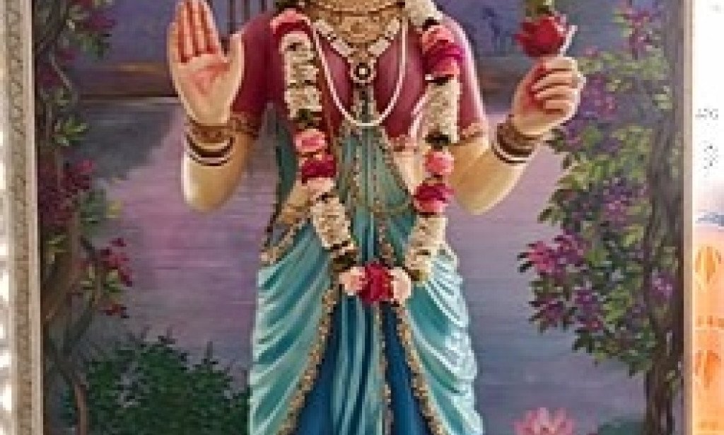 Tulsi ekjon udvid houar poreo kno Debi rupe pujito hoy